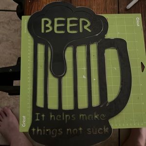 COPY - 17 x 11 1/2 metal shaped beer mug with a saying on the bottom.